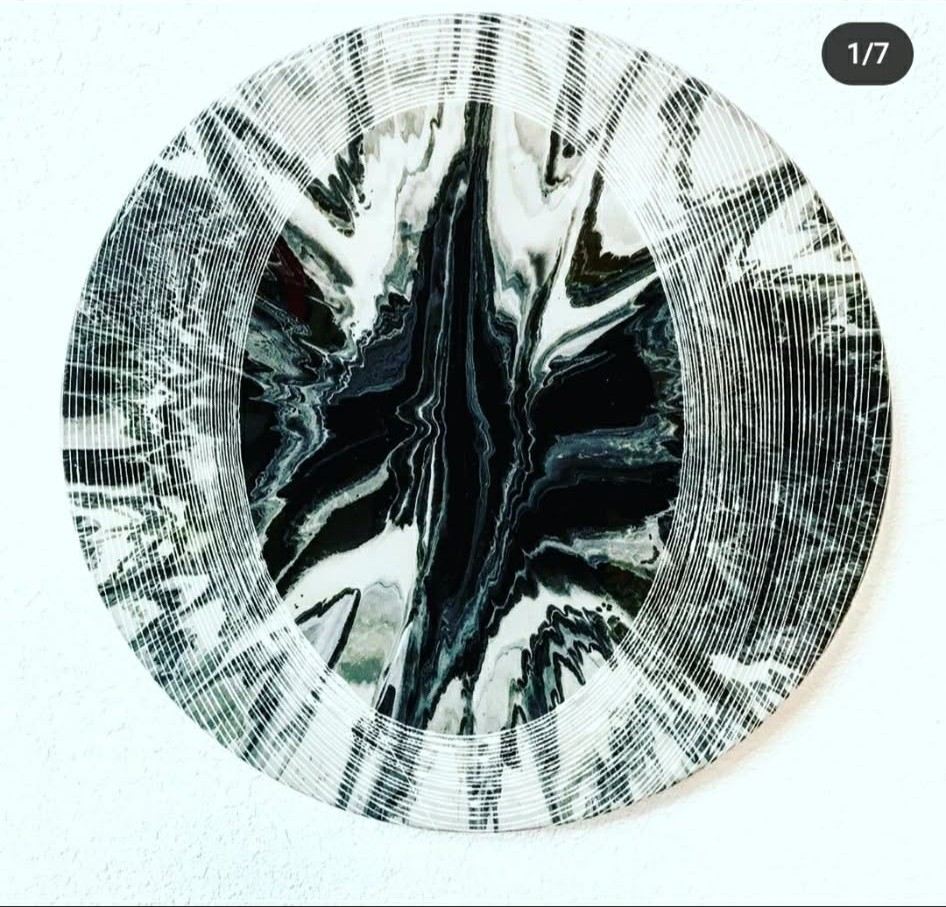 Round black and white spin painting